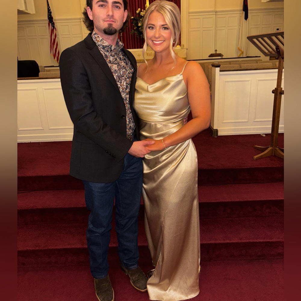 Champagne brides maids dress. Worn once. Size 10. Adjustable straps.